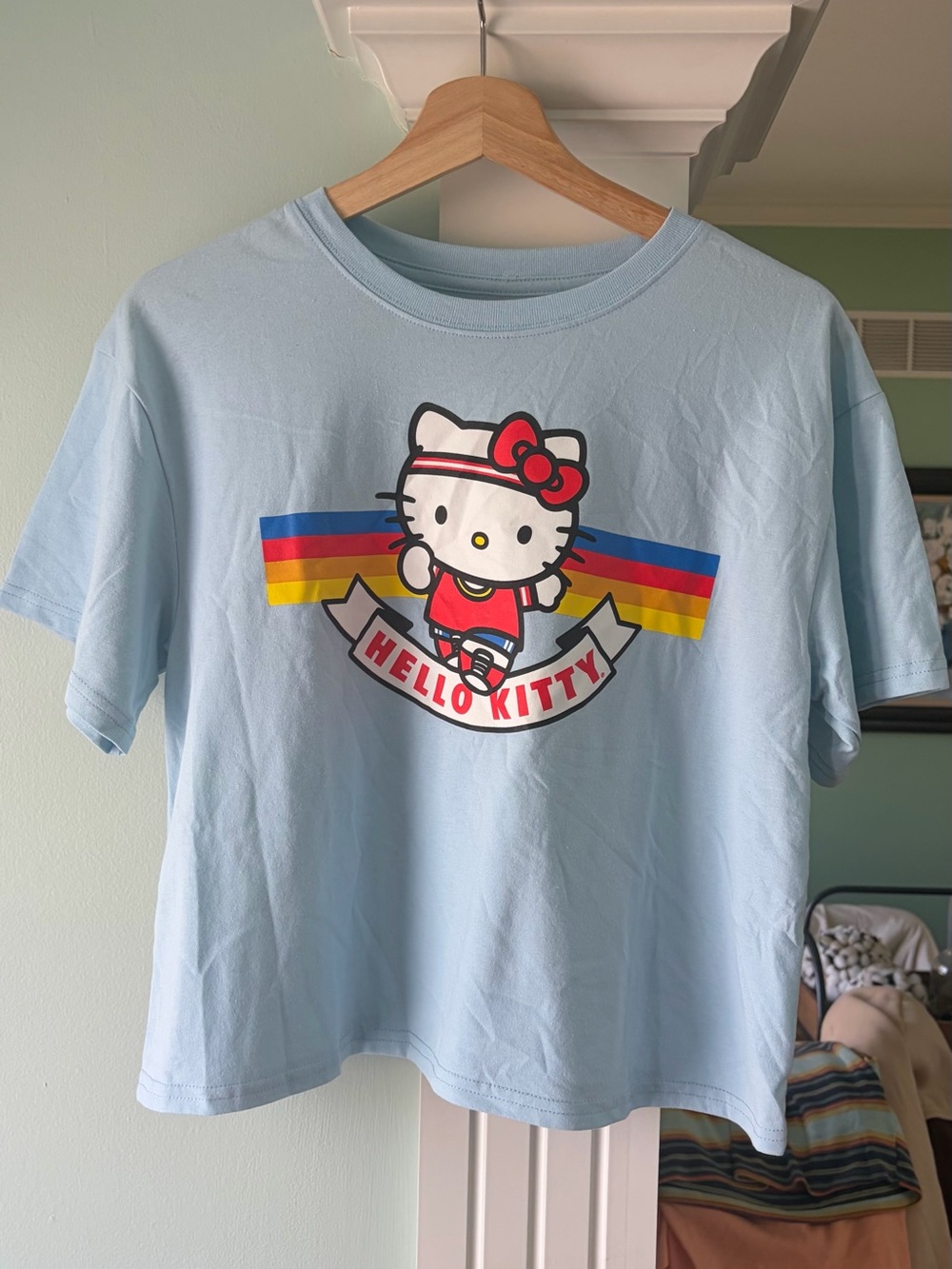 Hello Kitty Light Blue Tee with Retro Rainbow Stripes